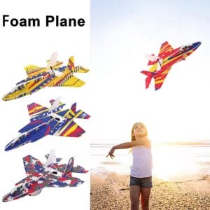 Child launching foam airplane outdoors