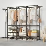 Clothes hanging on open metal closet in bedroom