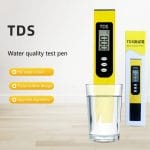 TDS tester alongside RO water filter setup