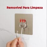 Hook holding kitchen utensil on tile