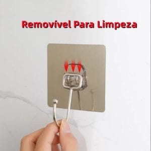 Hook holding kitchen utensil on tile